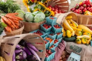 variety of vegetables tables and baskets