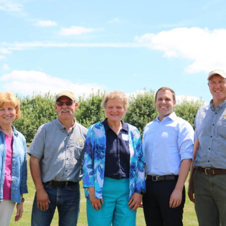 smiling group at the farm