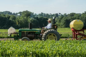 organic farmer on tractor