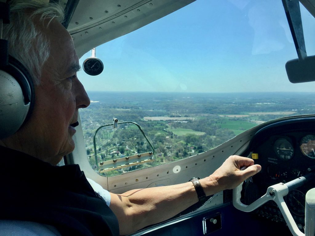 A pilot flies over the site of Rodale Institute's new research on agriculture and water conservation